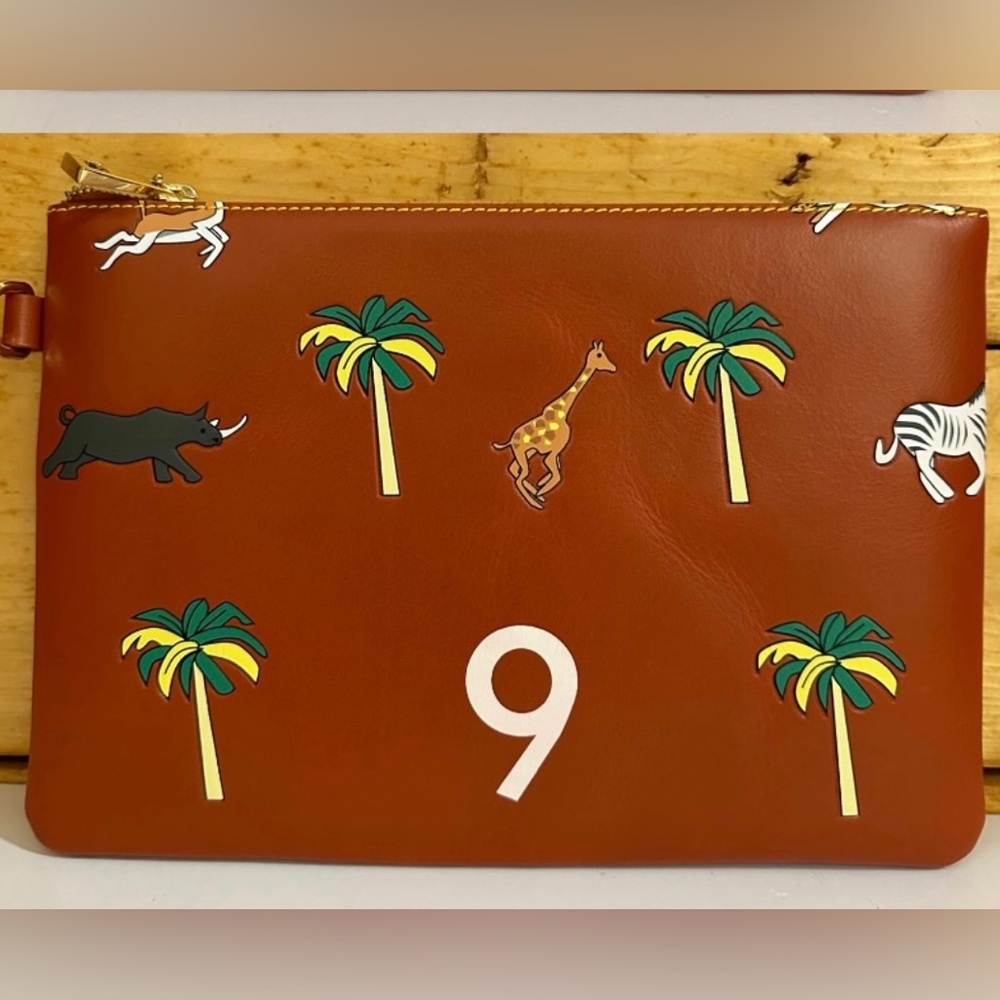 Very troubled child Darjeeling wes Anderson Safari clutch